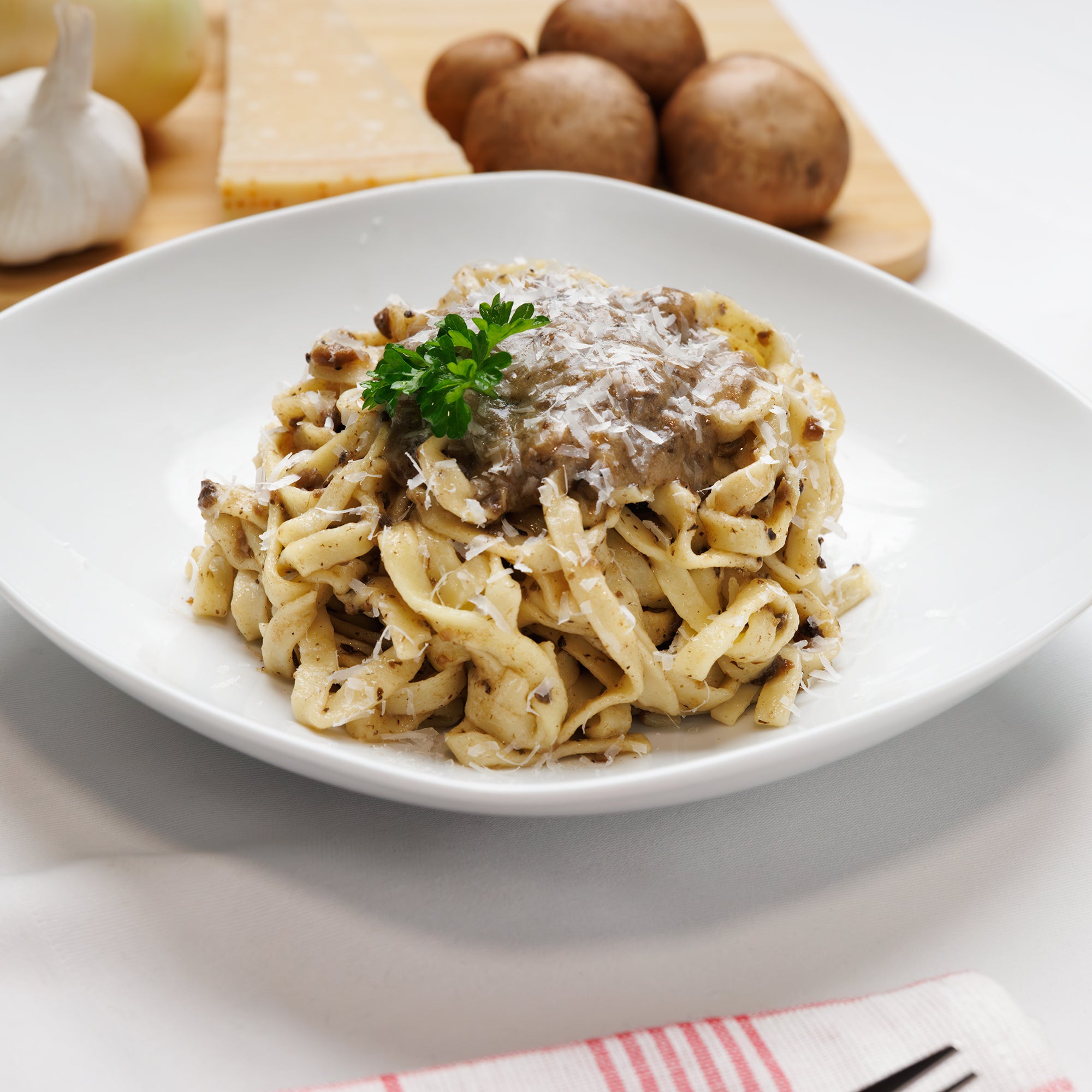 Tagliatelle mit getrüffelten Pilzen